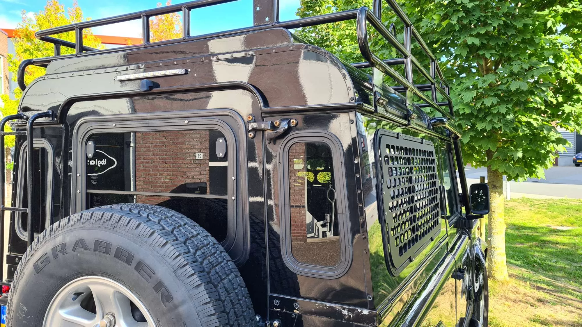 Explore Glazing Land Rover Defender tail door halfdrop window post MY2002