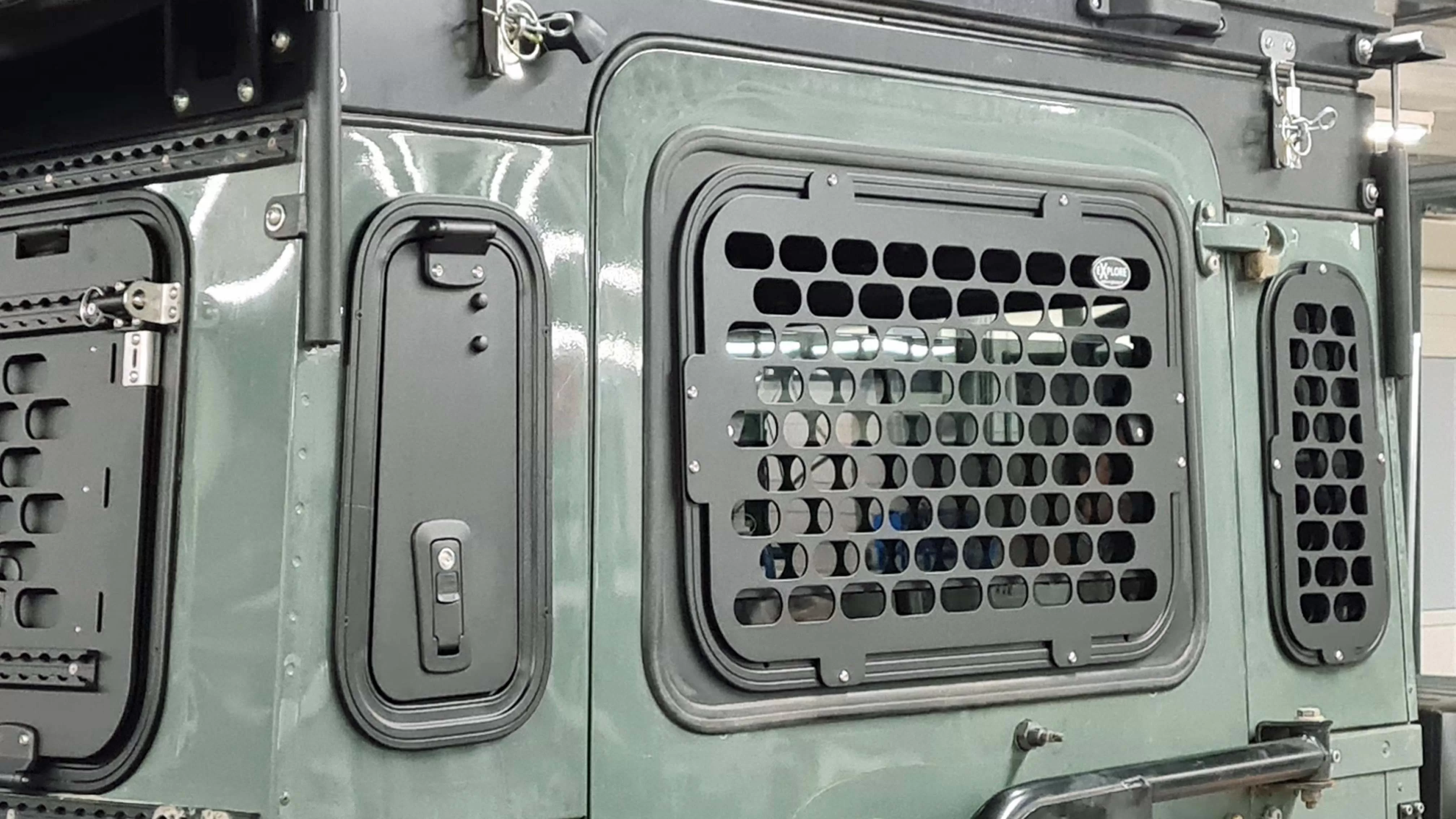 Explore Glazing Land Rover Defender Quarter window with external window guard