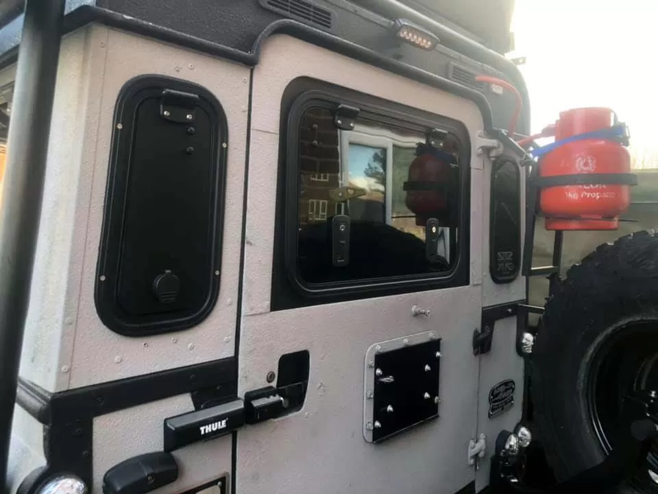 Explore Glazing Land Rover Defender taildoor gullwing window up to MY2002