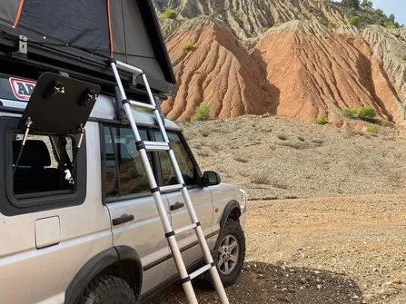 Explore Glazing Gullwing window aluminium mounted on a Land Rover Discovery 