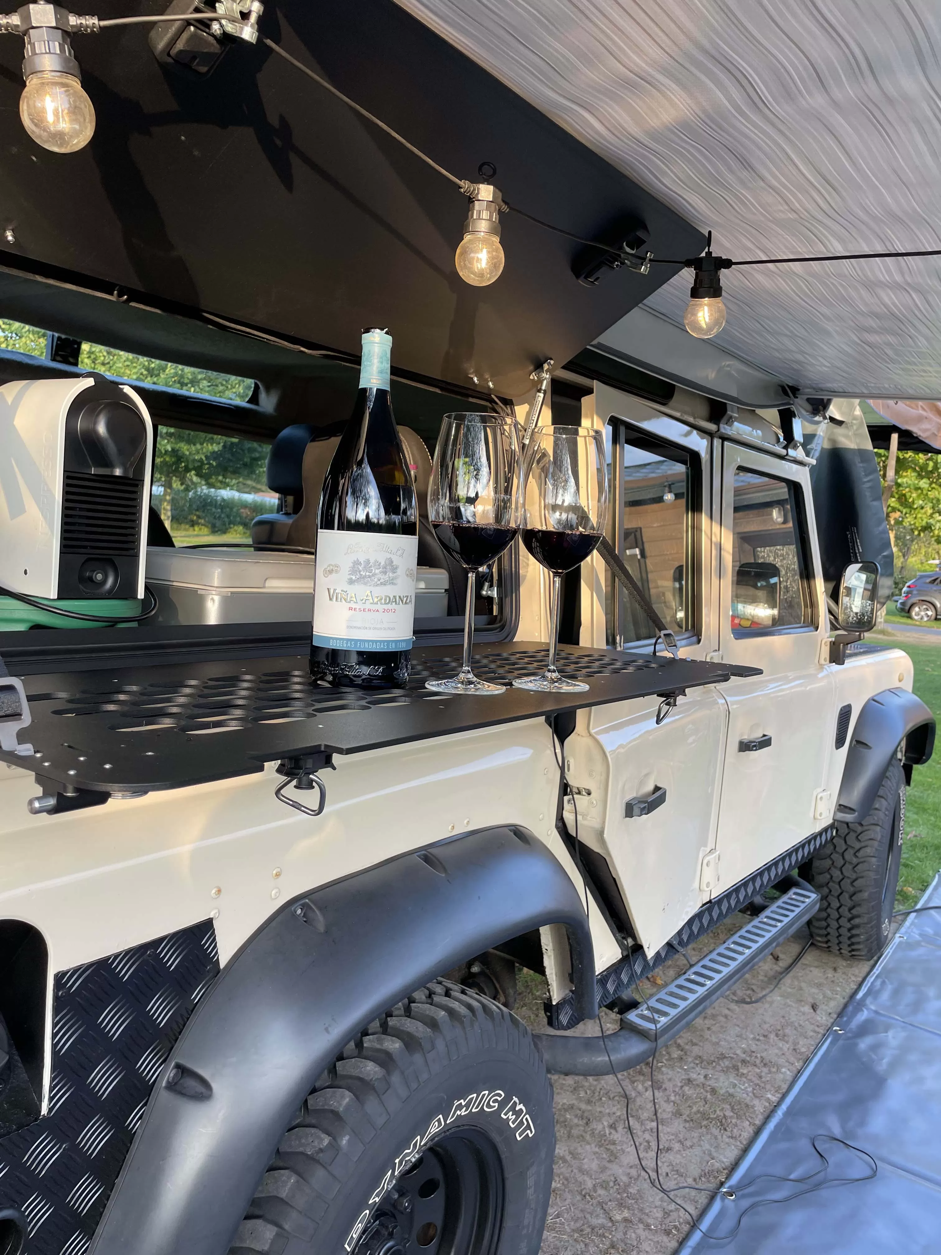Explore Glazing Land Rover Defender full aluminium gullwing window with an Explore Overlander fold down table.