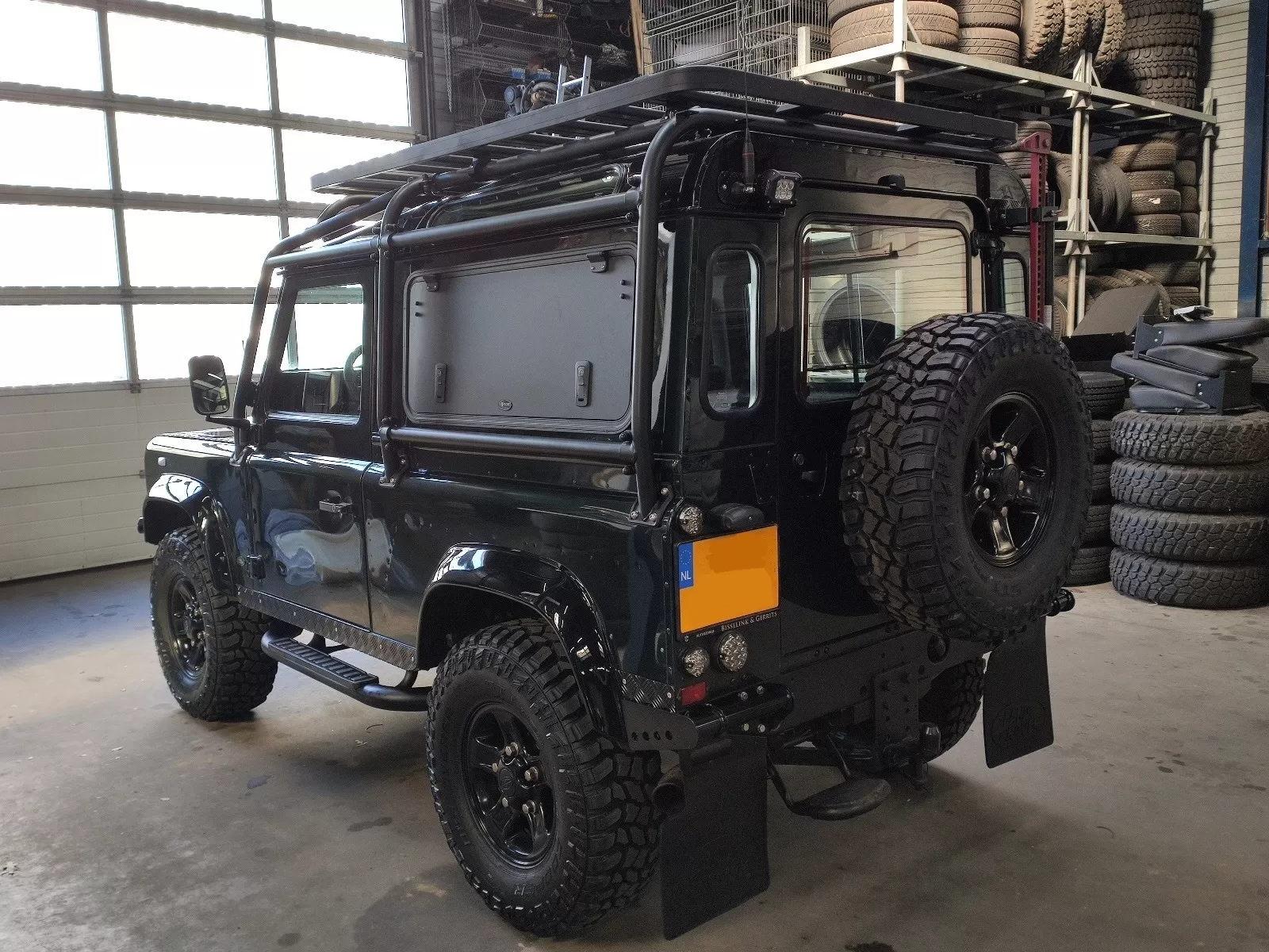 Closed Aluminium Gullwing Window by Explore Glazing on a Land Rover Defender.