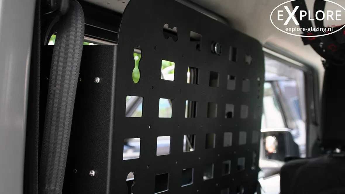 Inside view of Explore Glazing's black storage box with cut-out details in a Suzuki Jimny.