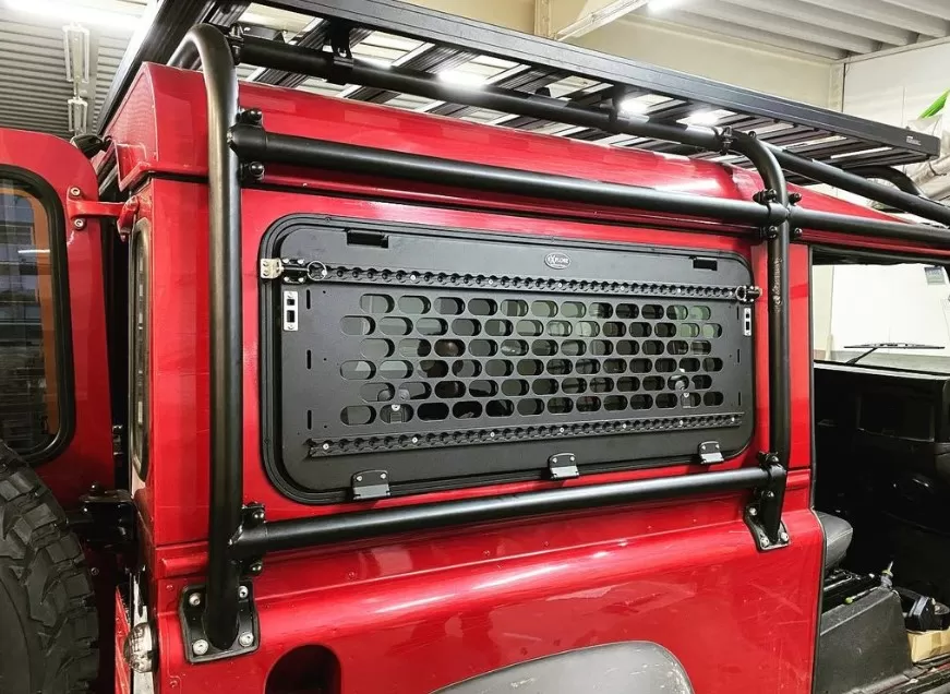 Explore Glazing Land Rover Defender gullwing window with an Explore Overlander fold down table.
