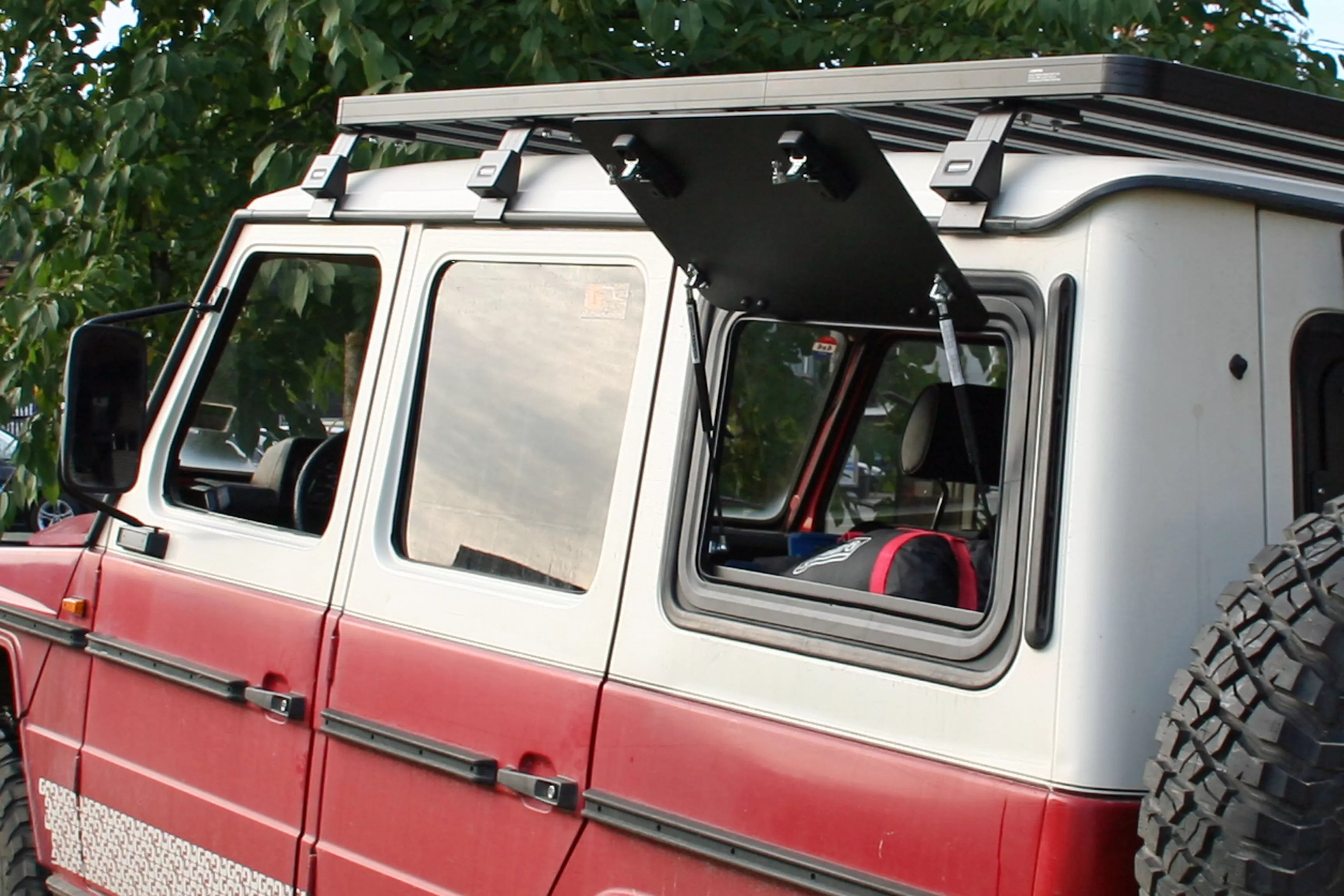 Explore Glazing Mercedes Gelandewagen LWB gullwing window aluminium