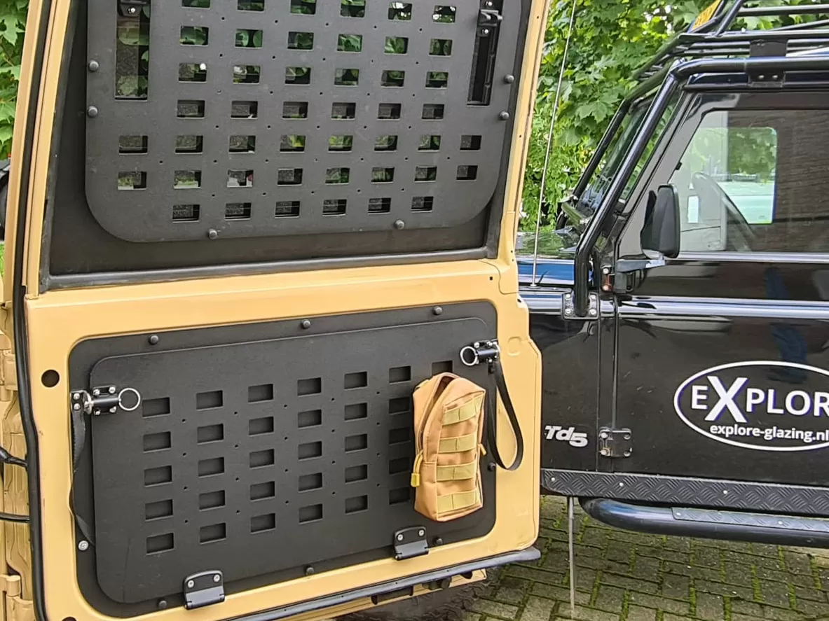 Explore Glazing Toyota 70 Series tail door swing out type - door panel fold down Molle table - right hand door and interrnal molle system upper window.